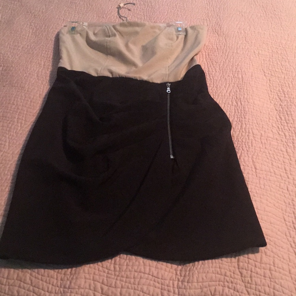 A fitting dress shoulder less too with ruffles.